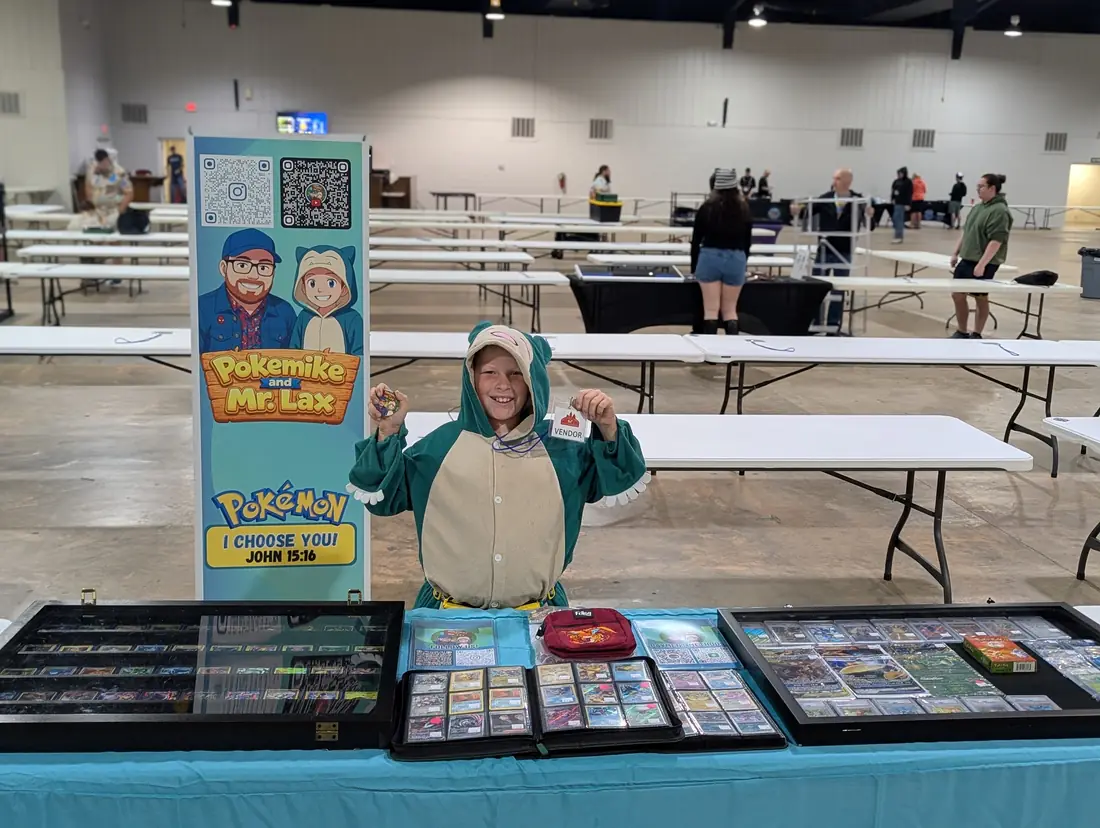 Mr. Lax in a Snorlax onesie at the table